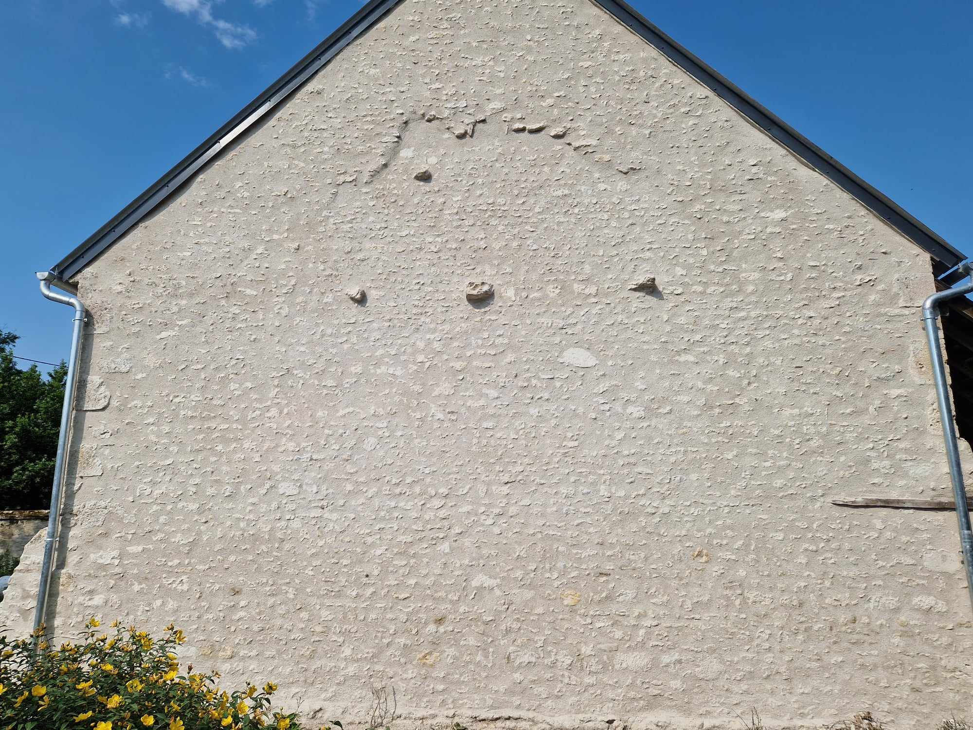 rénovation d'un mur en pierre