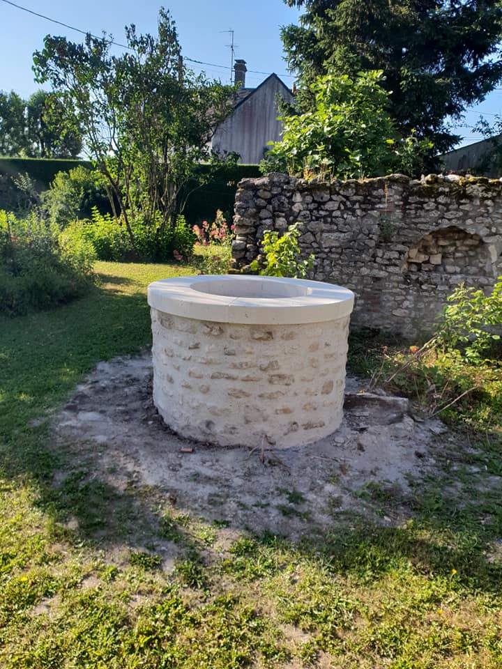 Réalisation d'un puit en pierre